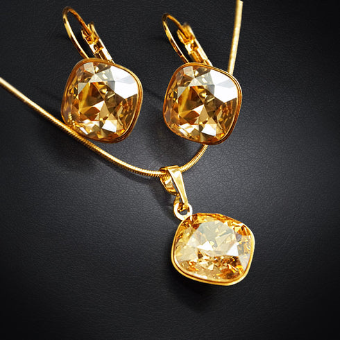 Комплект "Apžilbinošs Spīdums IV (Golden Shadow)" с кристаллами Swarovski™